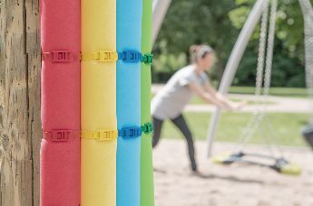 Not only because of their variety of colours, cable ties with low profile head are often used on children's playgrounds.