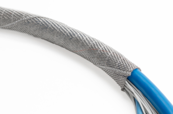 EMI-shielding and vibration resistant sleeves for cable protection in the railway industry