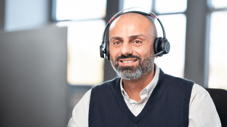 HellermannTyton service representative talking with a customer