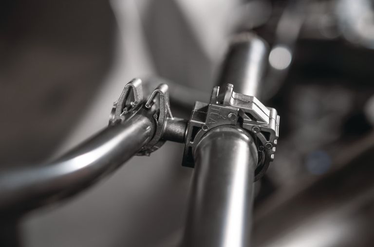 Modular fastener guiding two media-carrying lines