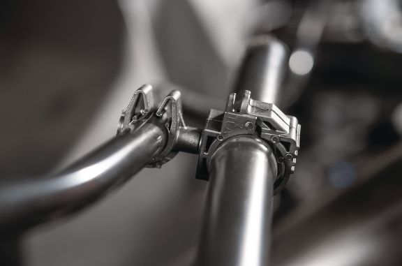 Modular fastener guiding two media-carrying lines