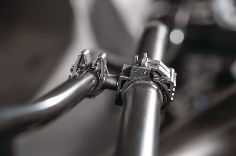 Modular fastener guiding two media-carrying lines