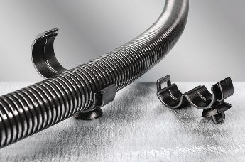 Convoluted corrugated tube clamp for fluid routing in vehicles