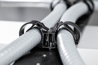 Three automotive fluid lines routed in parallel