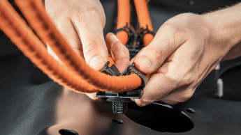 EV harness assembly in hole mount