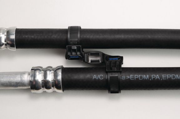 HVAC lines held in parallel by a Soft Grip mount and tie