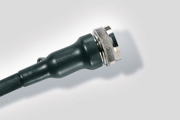 Heat shrink tubing connection for circular grooved adapters