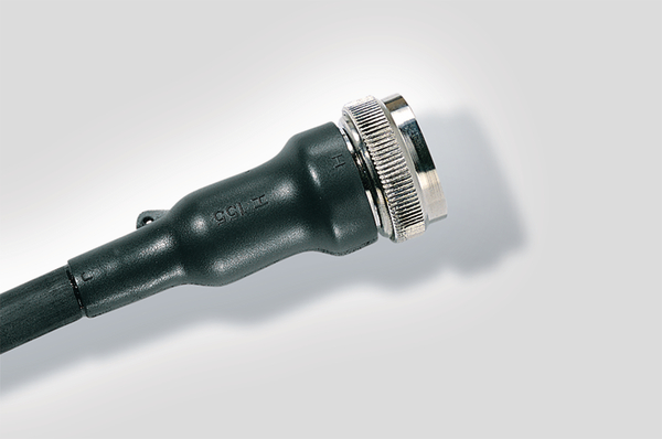 Heat shrink tubing connection for circular grooved adapters