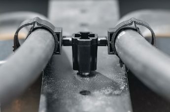 Stud mount clip for parallel routing of hoses