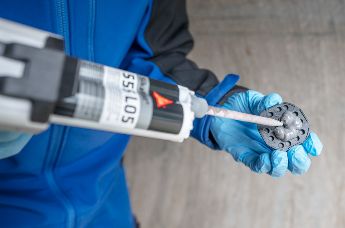 Adhesive cable tie mounts for wind turbine gearboxes