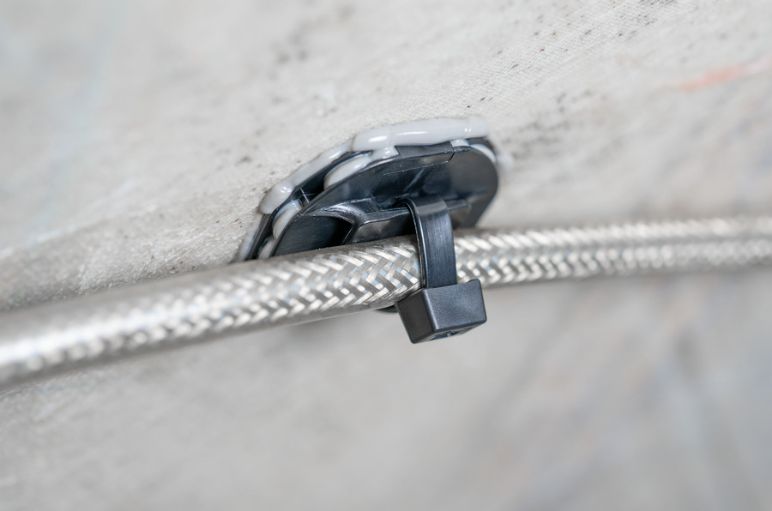 Cable tie mounts for nacelle and tower