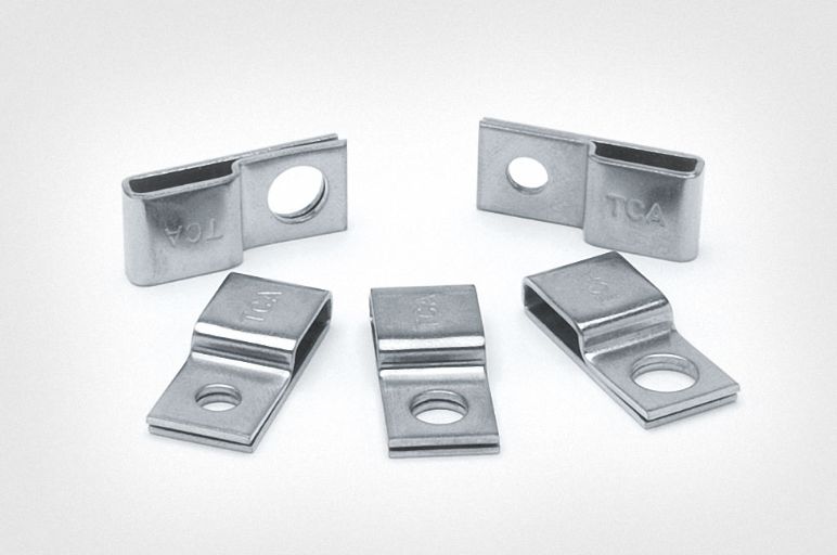 Steel cable clamps for harsh environments
