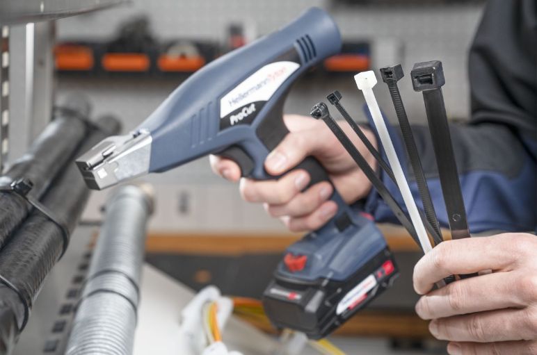 Battery-operated handheld cable tie gun