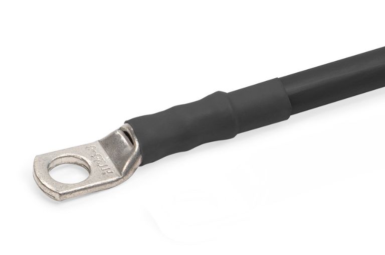 Semi-rigid polyolefin heat shrink tubing with an inner liner of hot melt adhesive.
