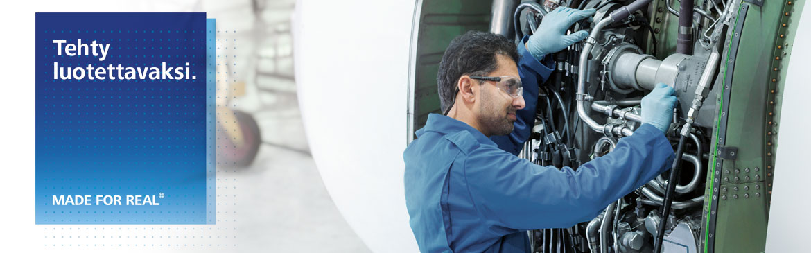 men working on jet engine