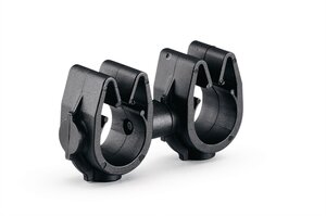 A rotatable dual routing clip that keeps two routings secured and separated.
