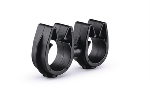 A rotatable dual routing clip that keeps two routings secured and separated.