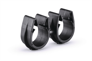 A rotatable dual routing clip that keeps two routings secured and separated.