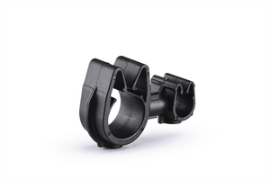 A rotatable dual routing clip that keeps two routings secured and separated.