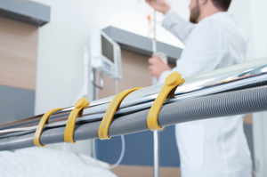 Hose with magentic CKL330 attached to the hospital bed.