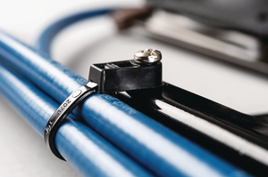 Secures with a screw or bolt.