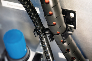 Attached to a mounting base, Helawrap can be self-adhered to any surface.