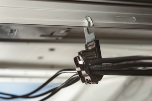 The Series 6 RPC Hanger can be mounted with one hand to a solar panel.