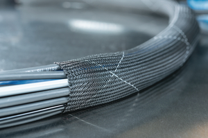 Treated yarns extinguish quickly and reduces potential flame spread to surrounding components.