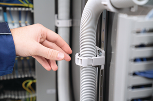 CTCC-IWS corrugated conduit holder and IWS corrugated conduit.