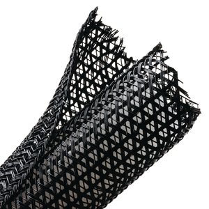 Expandable braided sleeving enlarges up to 150% of nominal diameter to accommodate irregular shapes.