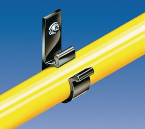 The clip is held in place by a screw and the bundled cable or pipe is guided securely.