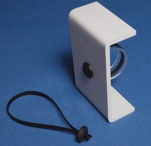 Two-piece button head cable tie allows parallel entry and exit through the head.