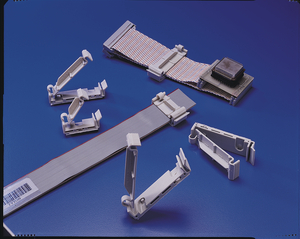 Clamp height is adjustable to accomodate the exact height of the ribbon.