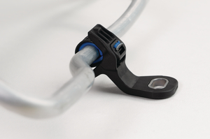 Soft Grip Cable Tie assembled with Soft Grip Mount for screw fixing e.g. for fluid management / air conditioning pipes.