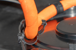 Firmly fixed edge clip with re-openable cable holder.