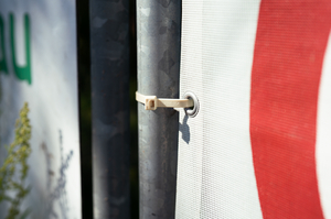 Ideal for events: the biodegradable T120R cable tie being used to attach a banner.