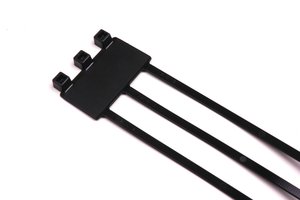 Cable tie features an identification plate to easily identify bundles.