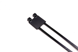 Cable tie features an identification plate to easily identify bundles.