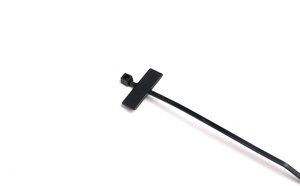 Cable tie features an identification plate to easily identify bundles.