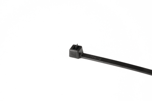 Releasable cable tie features a head design with extended pawl for quick release of bundles.