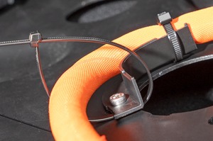 This cable routing clip can be mounted to the surface using either an M6 plastic push pin or an M6 screw, while its angled mini‑channel design guides wires smoothly past edges, curves, and structural obstacles when secured with cable ties.