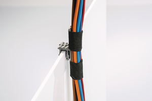 EC17 - Cables and leads can be fastened with adhesive tape to the bar of the mounting element.