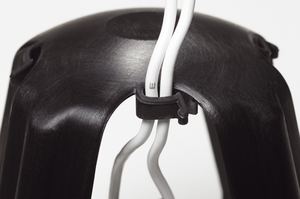 Cable retainers on the heat protection top hold the supply cable in place.