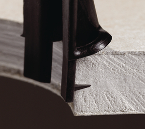 Additional retaining spikes prevent movement during mounting.