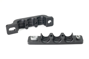 Strain relief clamp to securely fix and separate multiple bundles.