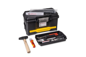 Opened black toolbox including tools.