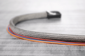 HEGEMIPV0 braided sleeve: EMI protection with enhanced flame retardance.
