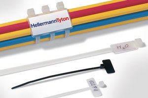 Cable tie features an identification plate to easily identify bundles.