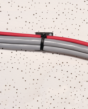 3. When installation is finished, Q-tie can be tightened and cut off - either manually or with an application tool.