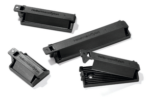 Clips pour câbles plats disponibles en 4 tailles et 2 versions : avec adhésif (FKH_A) ou à visser (FKH).